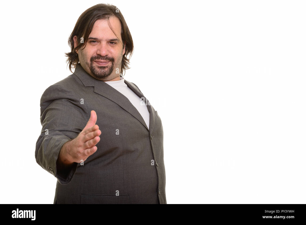 Happy fat Caucasian businessman smiling et poignée donnant Banque D'Images