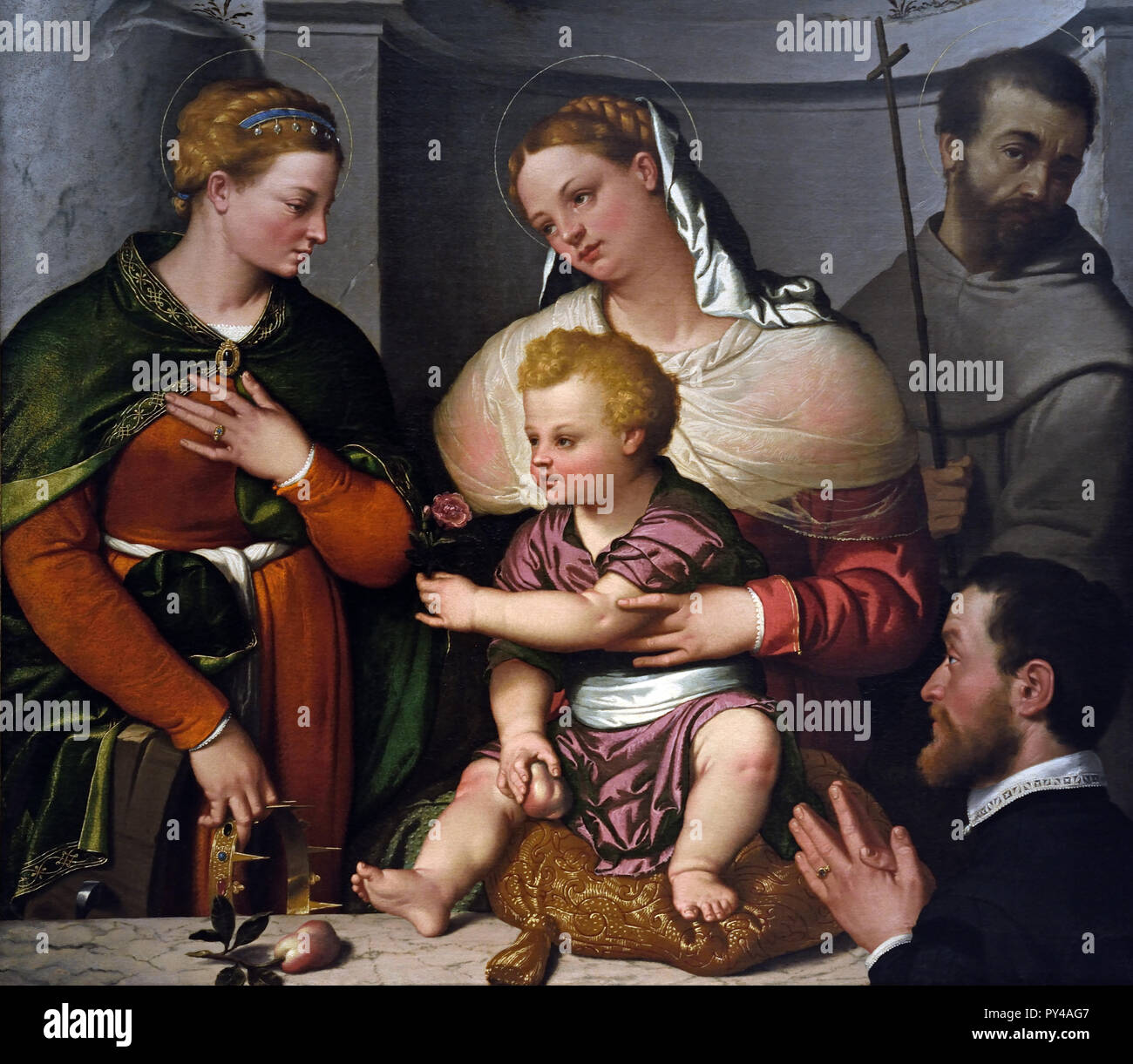 La Madone et l'enfant avec les saints Catherine et Francis et le donateur 1540 - 1550 par Giovan Battista Moroni 16e siècle, l'Italie, l'italien. Banque D'Images