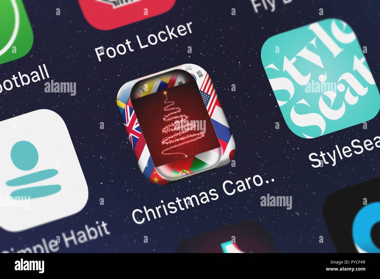 Londres, Royaume-Uni - 26 octobre 2018 : Capture d'écran de l'application mobile monde chants de Noël d'KISSAPP, S.L. icône sur un iPhone. Banque D'Images