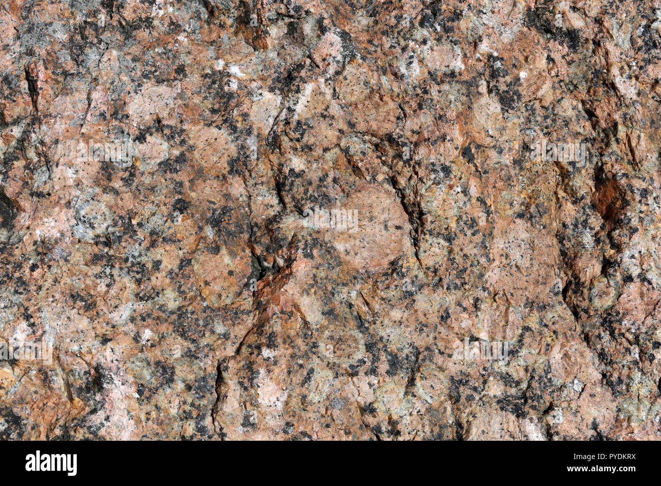 Belle texture de surface rouge et noir d'un rock brillant. Un na​tura​l intéressante texture qui peut être utilisé par exemple comme arrière-plan ou le papier peint Banque D'Images