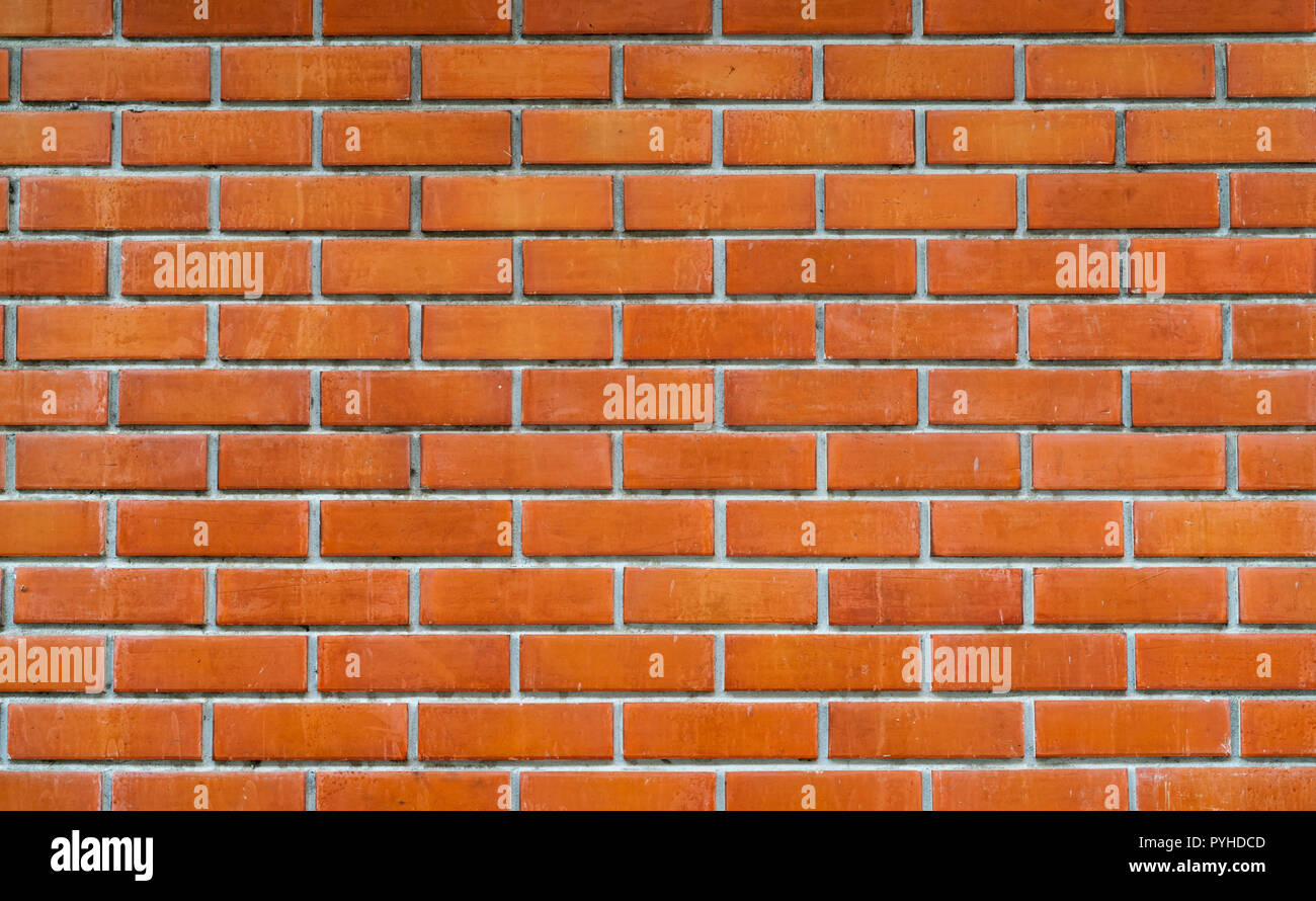 Mur de brique Orange texture background. Arrière-plan de texte. Architecture extérieure concept. Mur de brique orange sale abstract background. Pour l'arrière-plan Banque D'Images