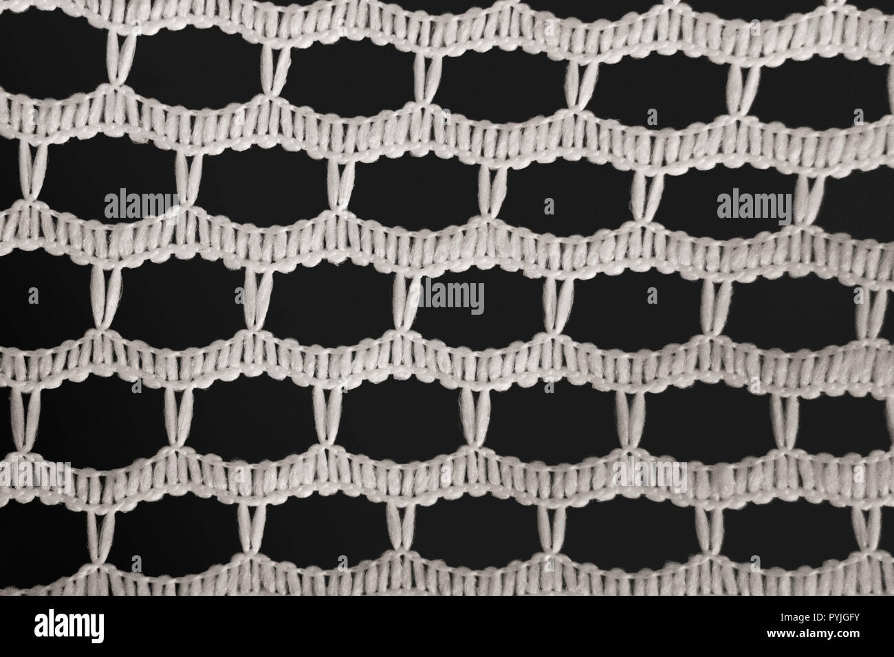 Texture dentelle - Blanc sur fond noir Banque D'Images