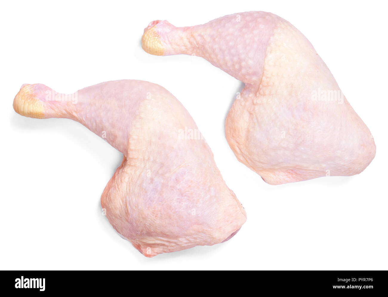 La viande de poulet crue fraîche, isolé sur fond blanc. Pilons de poulet ou des jambes, vue d'en haut. Banque D'Images