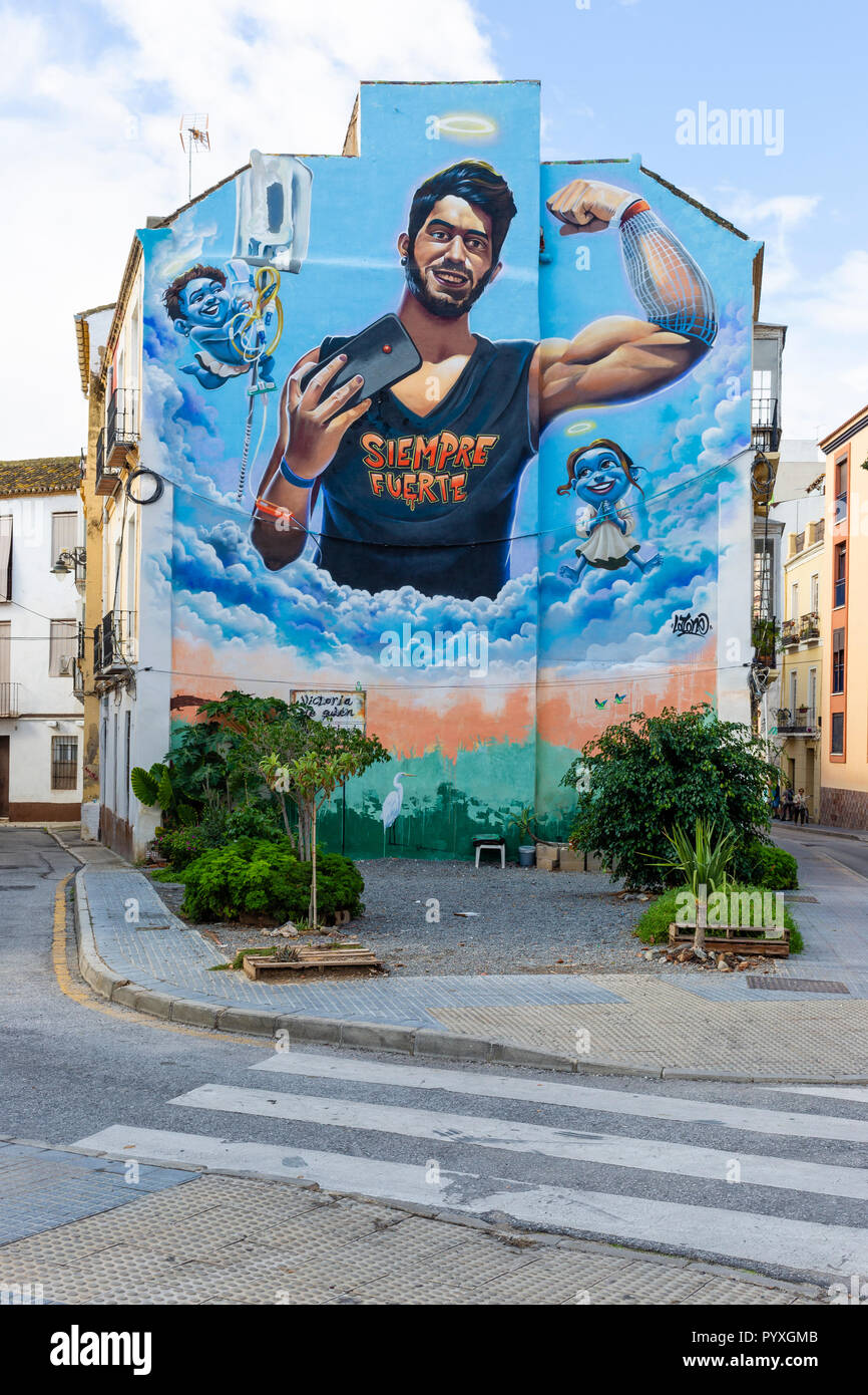 Street Art Graffiti dans une zone pauvre de Malaga Espagne Banque D'Images
