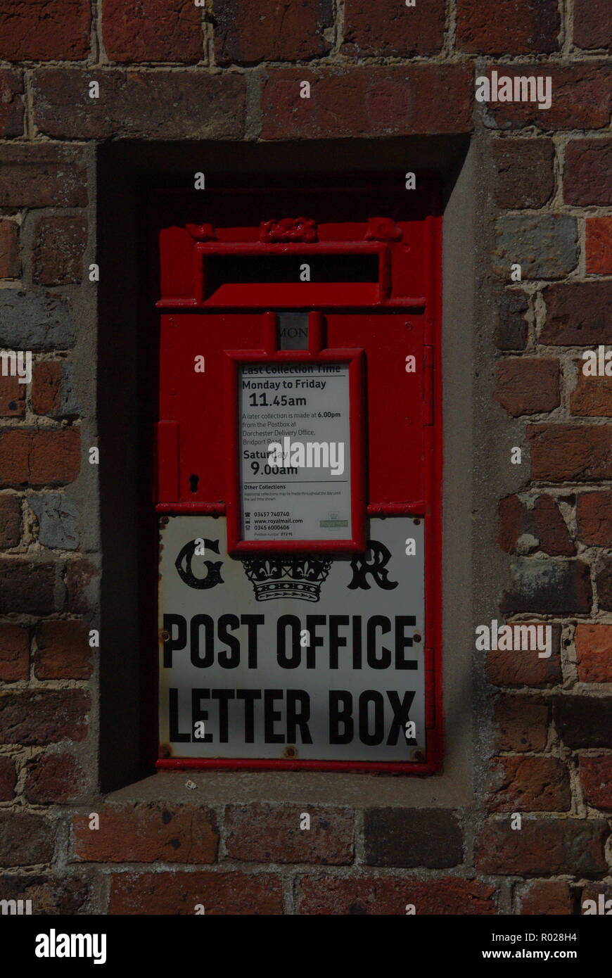 Old Post Box à Moreton, Dorset Banque D'Images