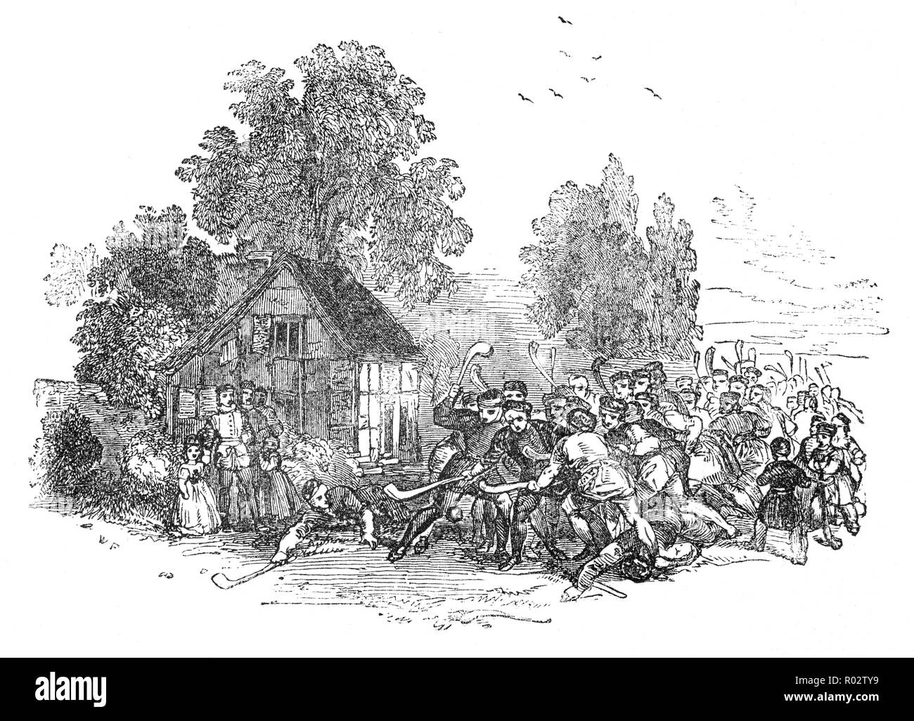L'anglais médiéval Hurling était un jeu apprécié par les classes inférieures et moyennes habituellement contre paroisse paroisse. Il a été joué plus de collines, Dales, haies, fossés, bois et rivières. Banque D'Images
