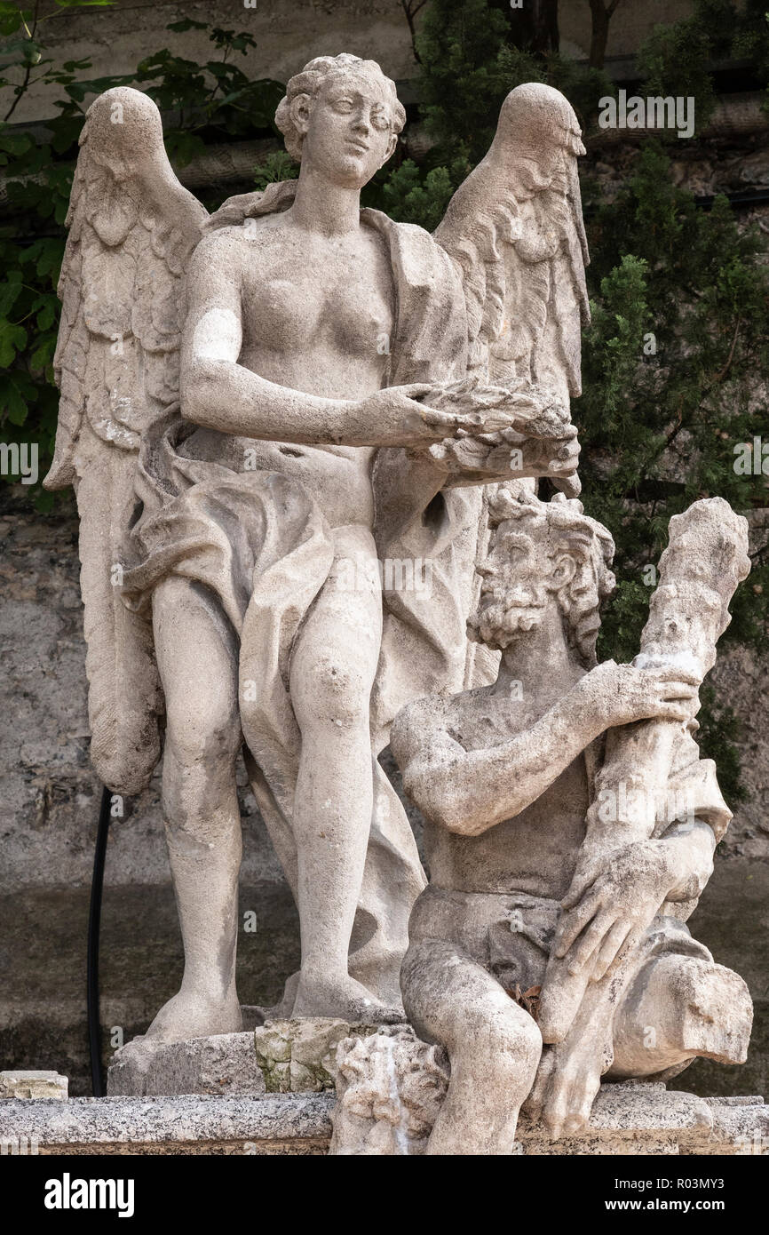 Statue dans les jardins de Villa Monastero à Varenna sur le lac de Côme, Italie Banque D'Images