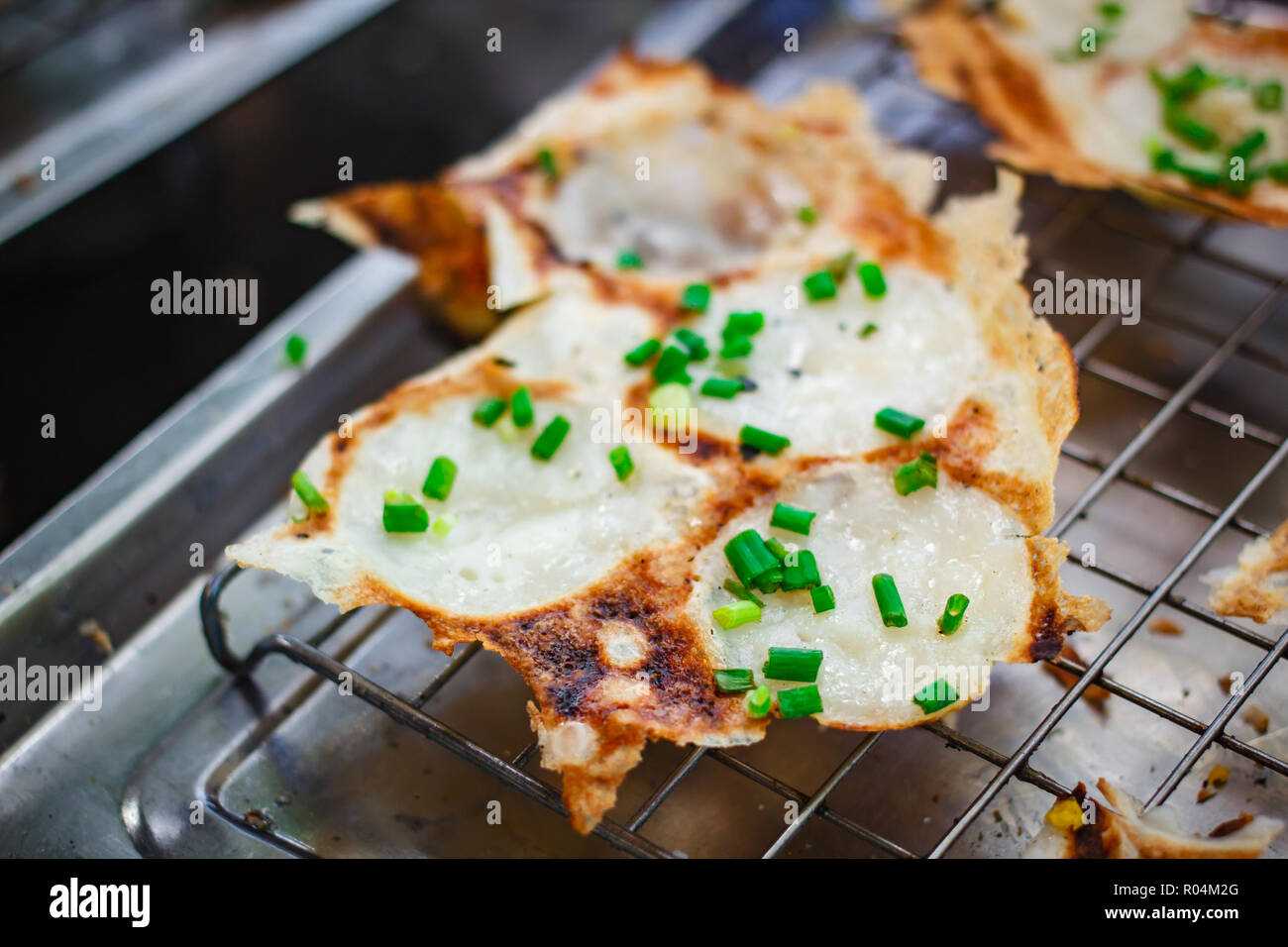 Genre de Thai sweetmeat, Kanom Krok, thai dessert à l'alimentation de rue. Banque D'Images