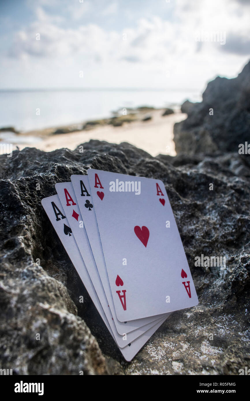 Quatre d'une sorte de carte ace poker gamble thème plage Banque D'Images