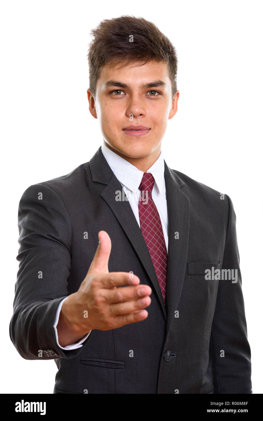 Young handsome businessman et poignée donnant looking at camera Banque D'Images