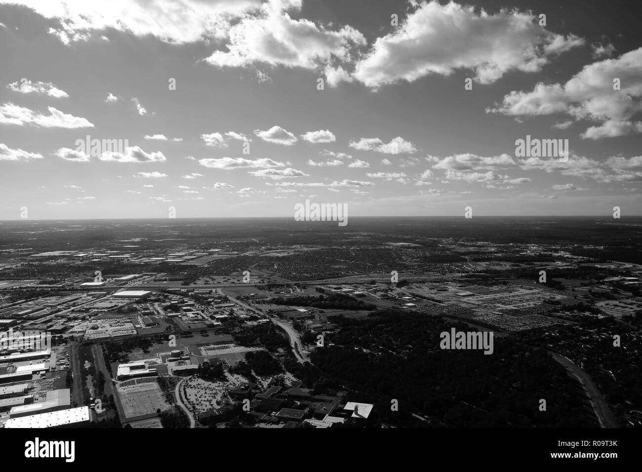 Plein Vol vue depuis la fenêtre de l'avion du Texas ciel au-dessus de Houston, Texas, USA. Banque D'Images