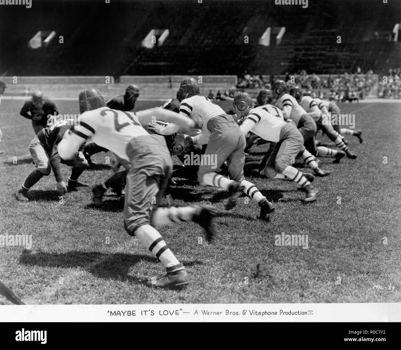 Match de football, sur-ensemble du film, "peut-être c'est l'amour', Warner Bros., 1930 Banque D'Images