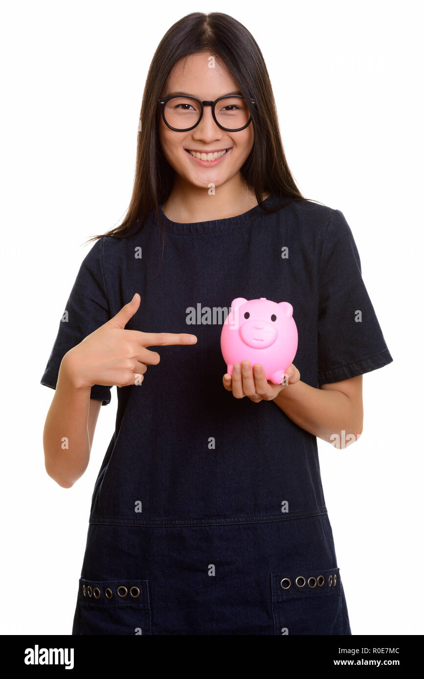 Les jeunes professionnels Asian teenage girl smiling while face ; Banque D'Images