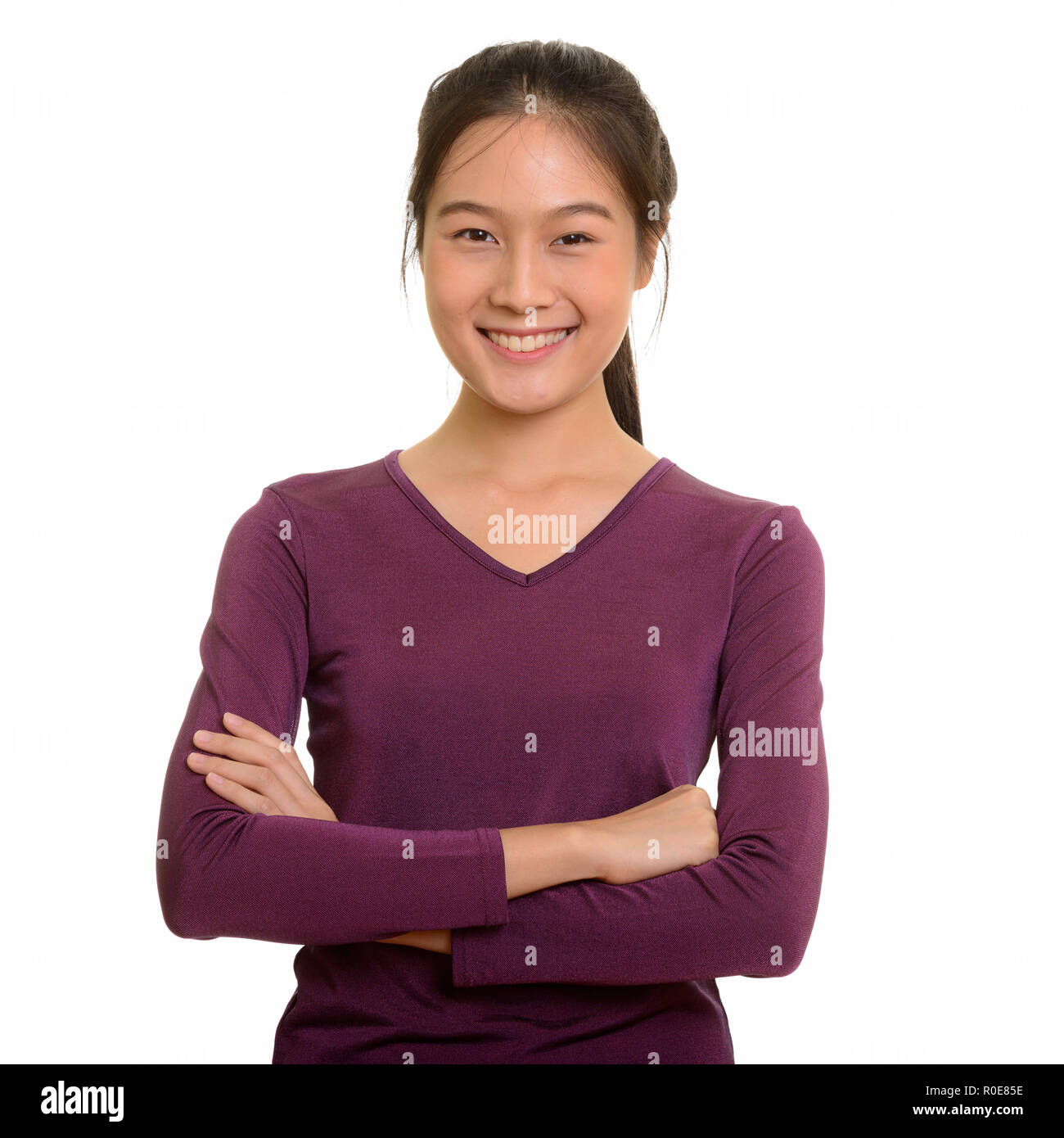 Portrait of young happy Asian teenage girl smiling Banque D'Images