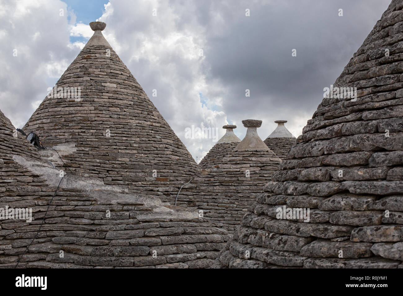 Trulli Alberobello, toits coniques, Trulli Village, Toscana, Italie. Alberobello est une petite ville (environ 11 000 ) dans les Pouilles en Italie du sud contiennent Banque D'Images