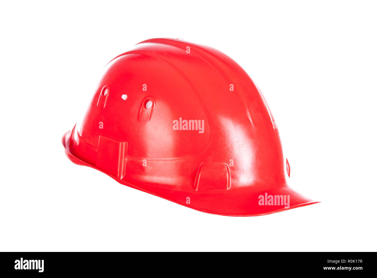 Casque rouge isolé sur fond blanc Banque D'Images