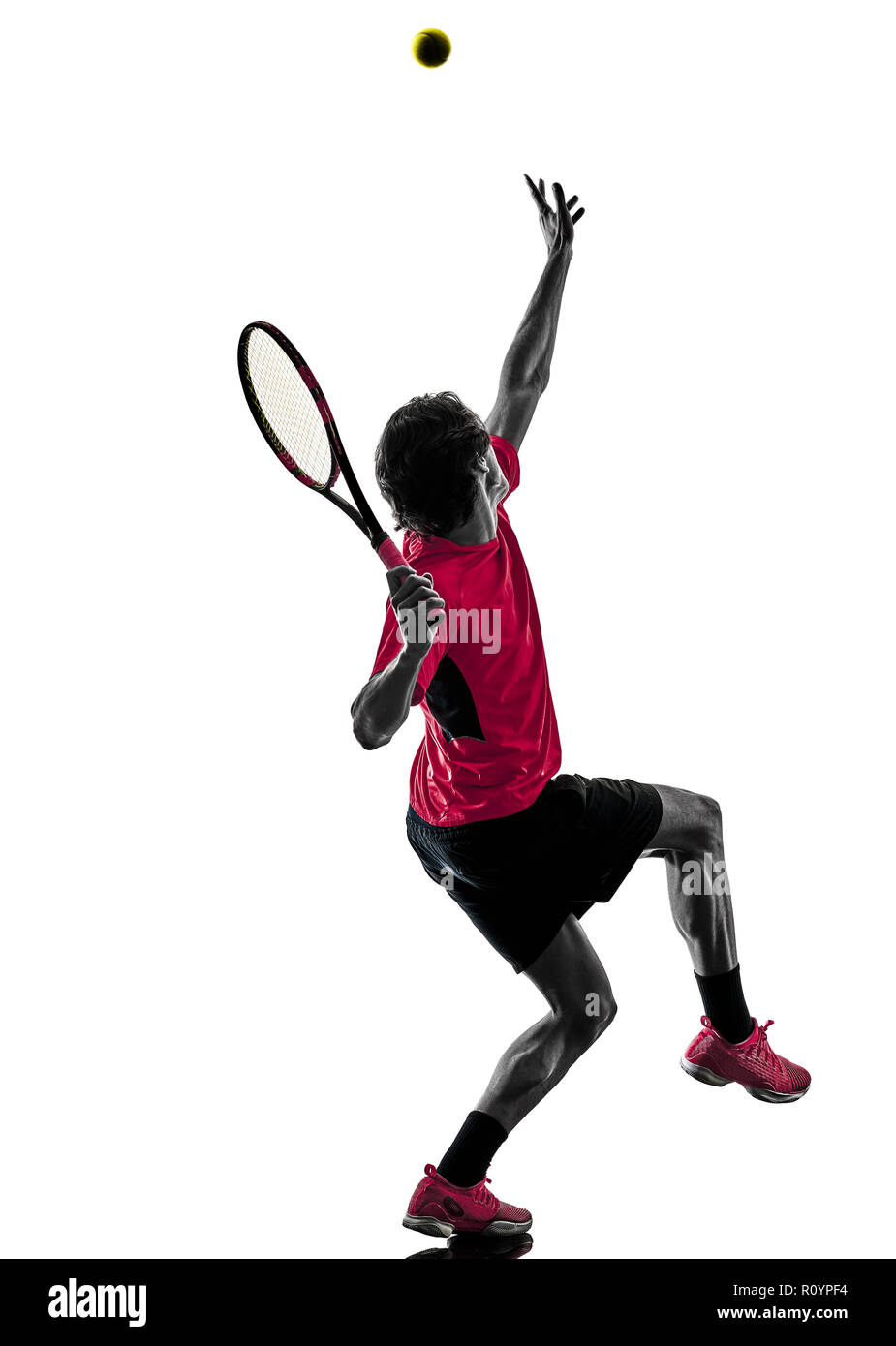 Portrait d'un joueur de tennis hispaniques dans l'homme silhouette studio isolé sur fond blanc Banque D'Images