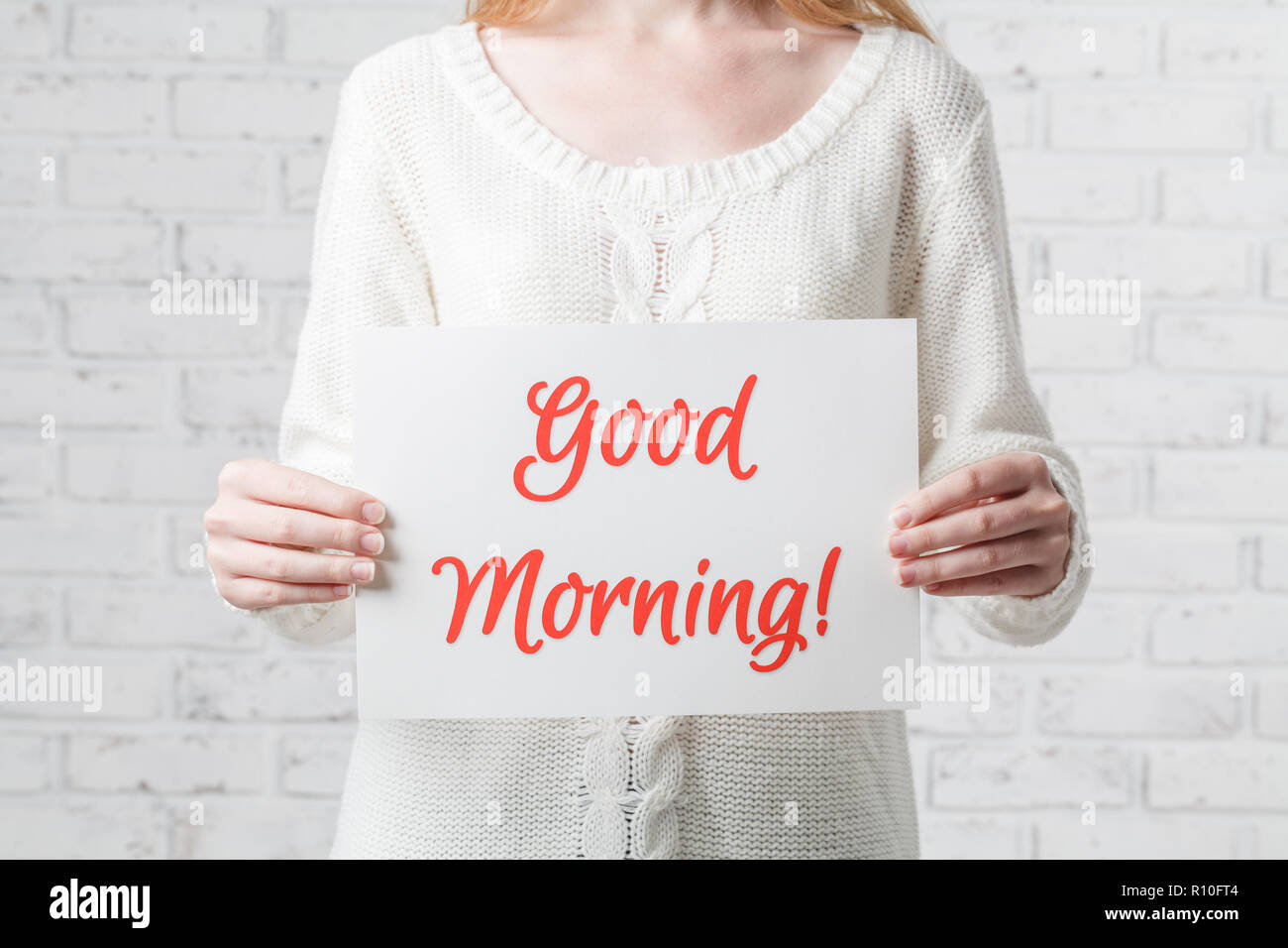 Bon matin inscription sur le bureau dans la main Banque D'Images