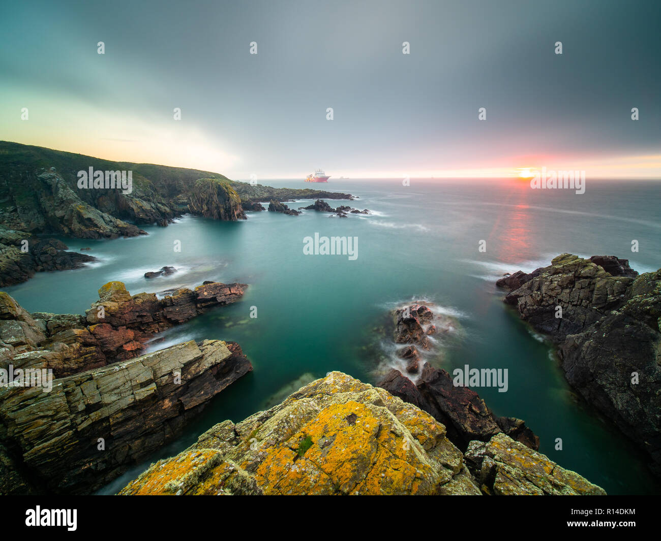 Lever du soleil sur les falaises d'Aberdeen Banque D'Images