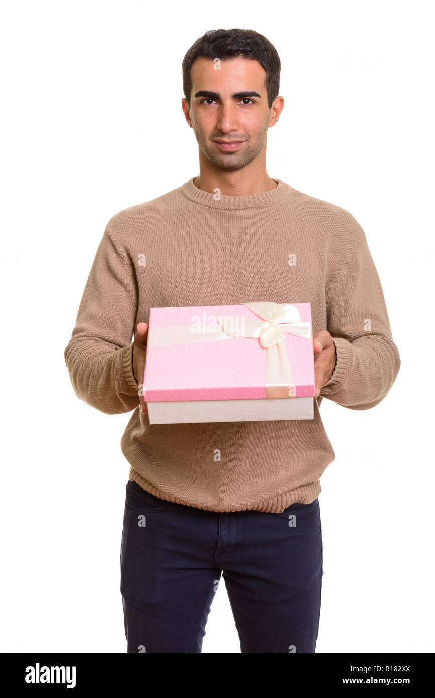 Portrait de jeune homme persan beau holding gift box Banque D'Images