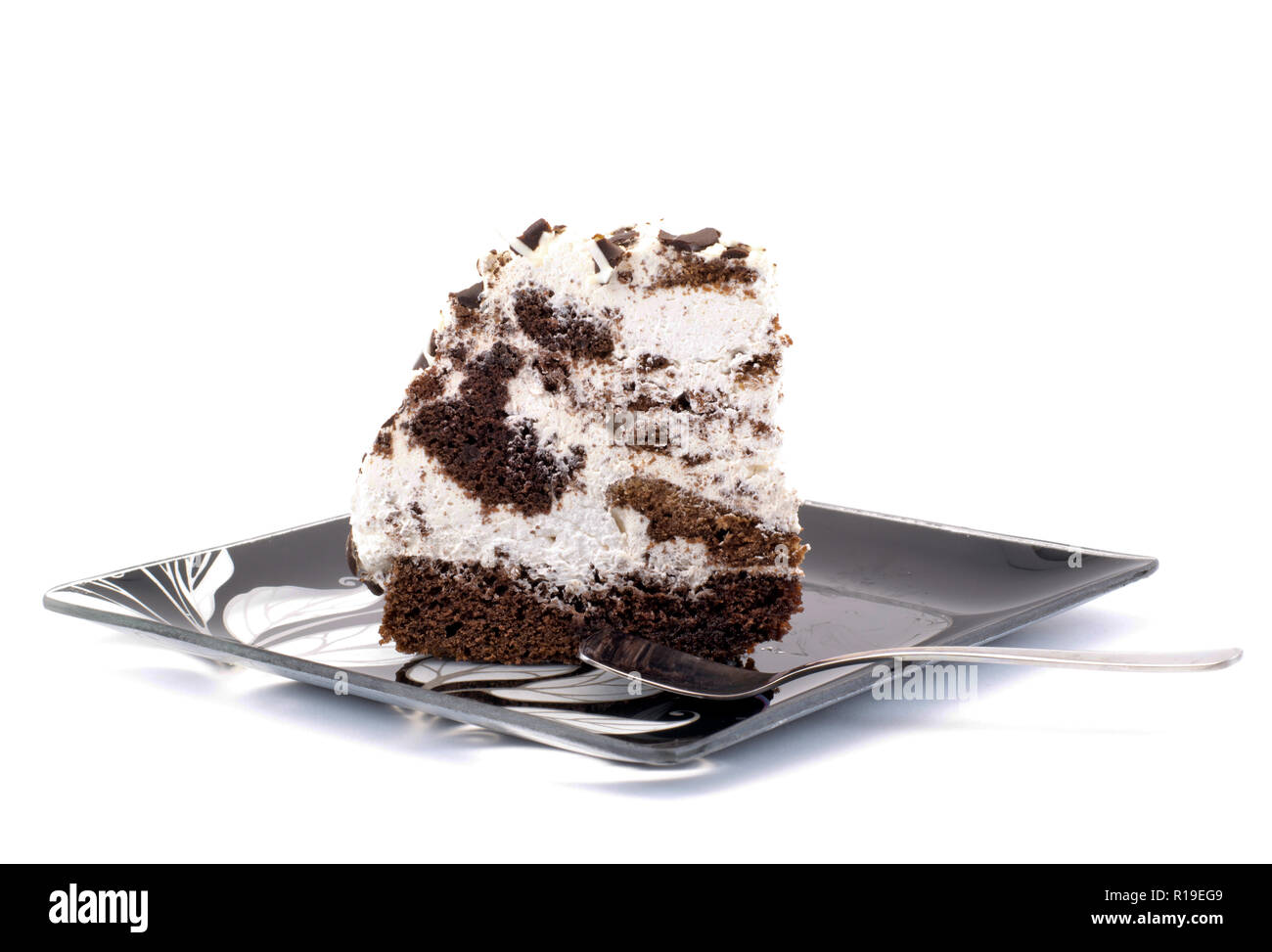 Morceau De Gateau Sur Une Assiette Avec Une Cuillere Isolated Photo Stock Alamy