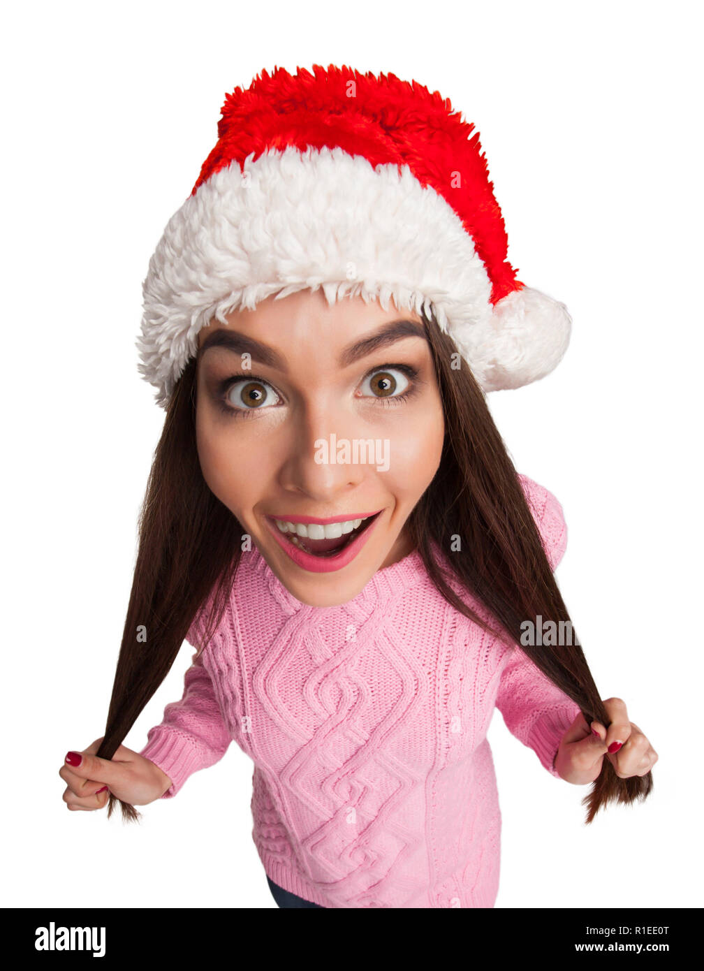 Girl in red hat tirant ses cheveux Banque D'Images