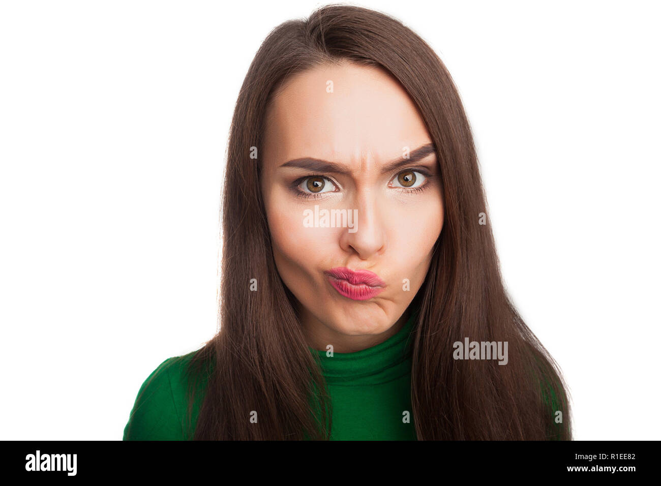 Femme dans un col roulé vert Banque D'Images