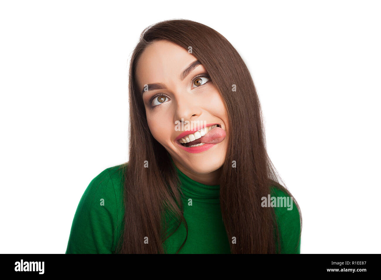 Femme dans un col roulé vert Banque D'Images