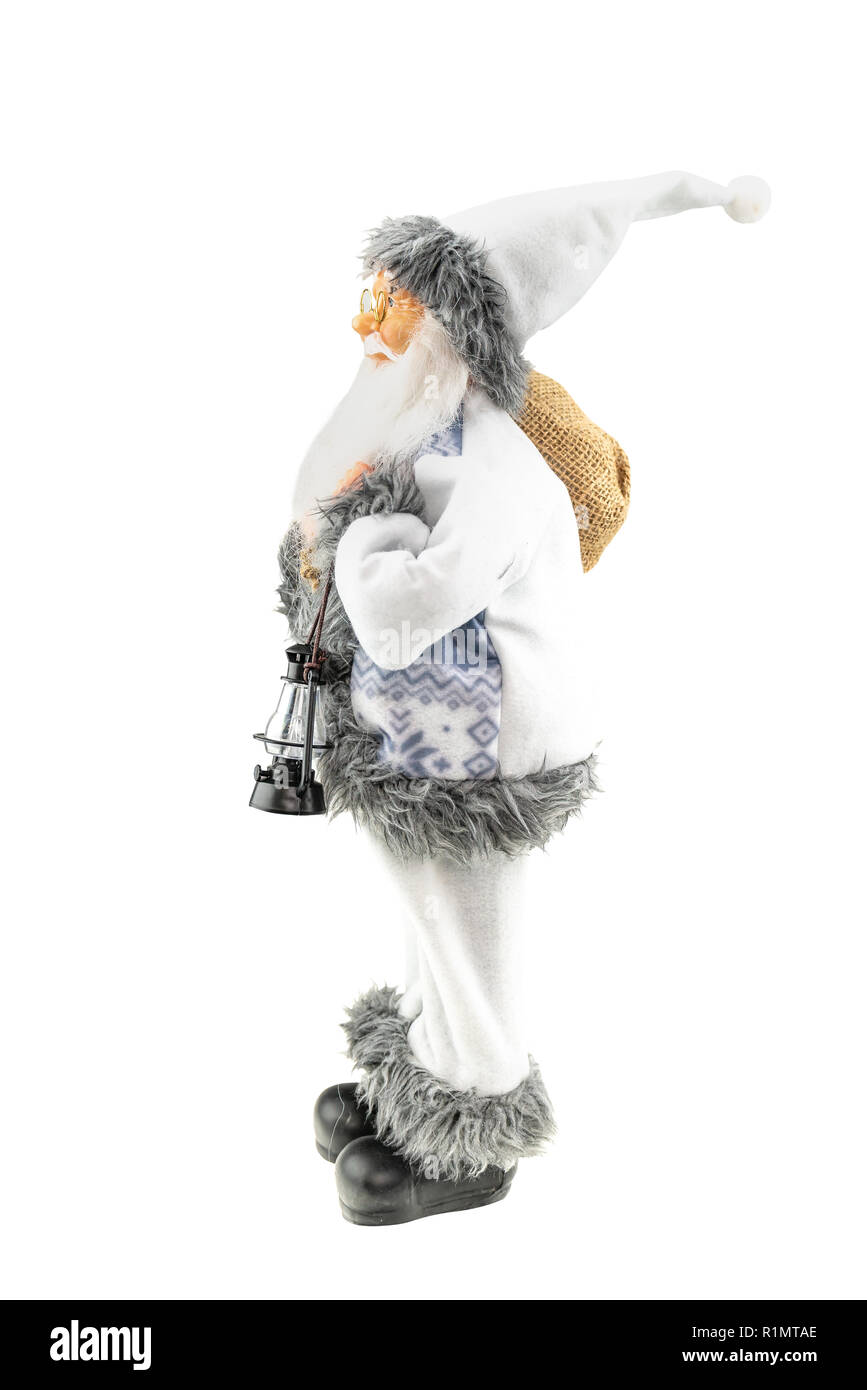 Santa Claus doll isolé en face de fond blanc. Profil latéral de la gauche. Banque D'Images