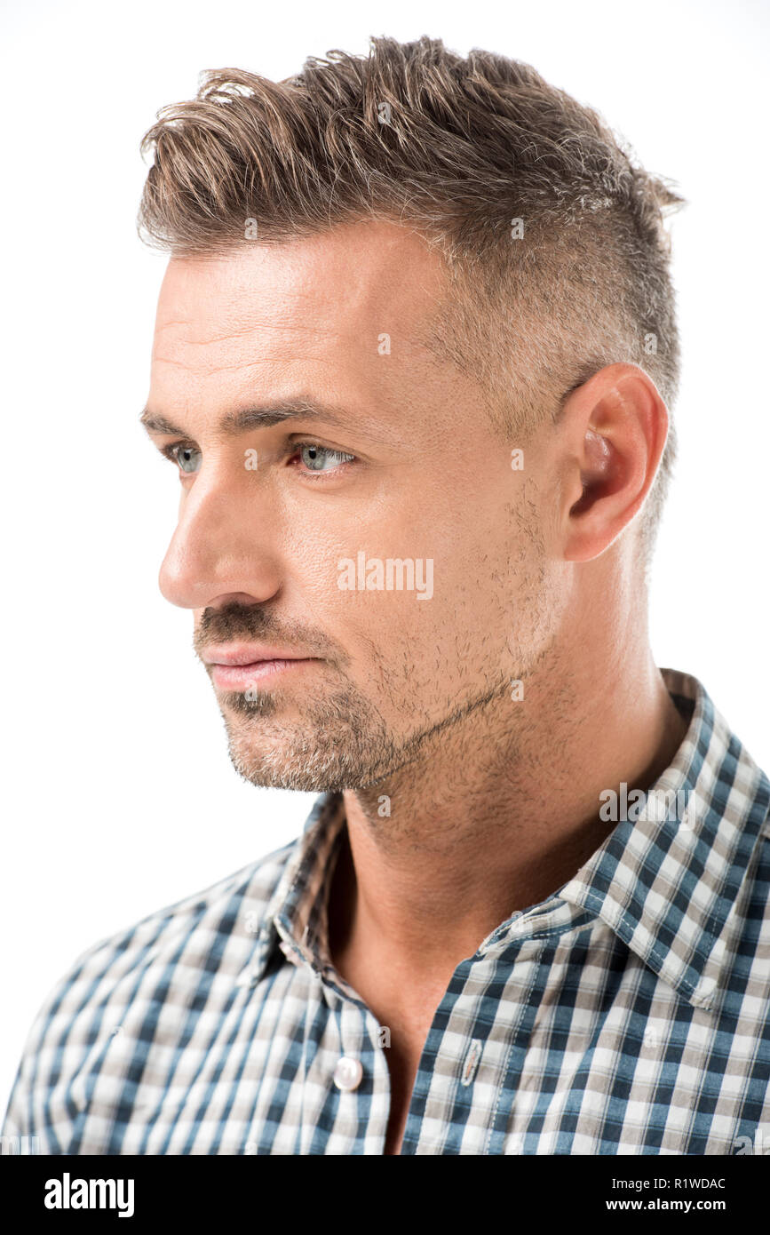 Close up portrait of smiling man sitting isolated on white Banque D'Images