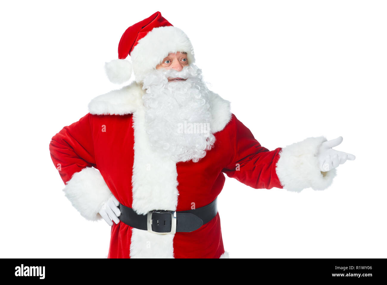 Père Noël barbu montrant quelque chose à Noël isolated on white Banque D'Images