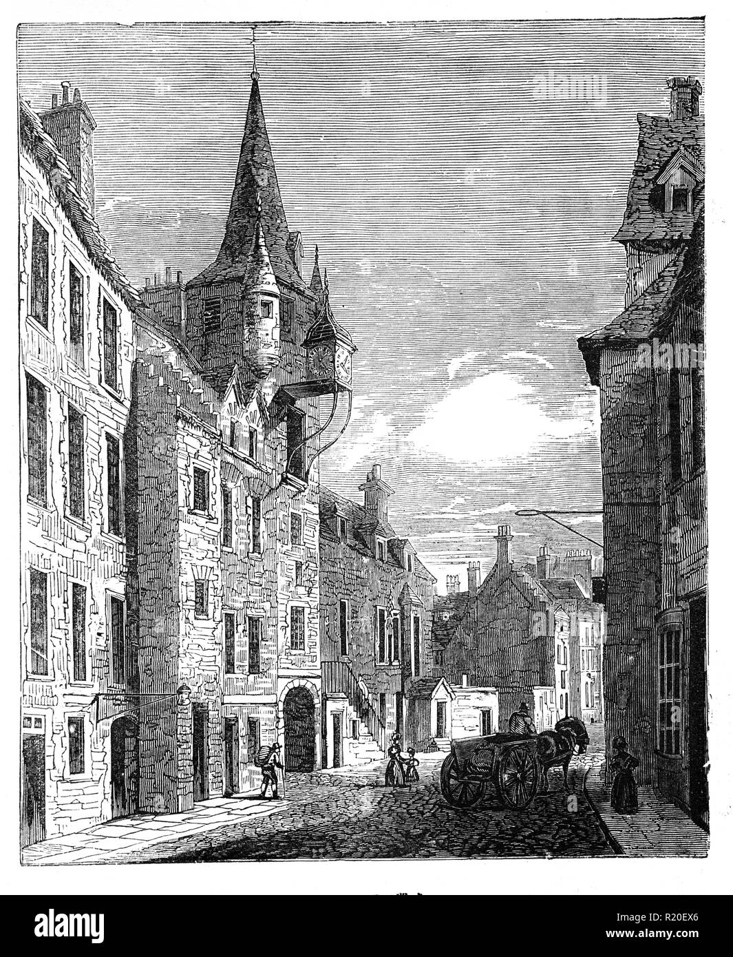 Le péage Canongate a été construit en 1591 et aurait formé le concentrateur local pour la Canongate burgh, ainsi que les commerçants à proximité Mercat Cross où se sont rencontrés et ont mené leur entreprise. Le péage aurait eu beaucoup de fonctions, servant de Burgh, palais de prison et lieu de rencontre du conseil de la ville. Le bâtiment a été construit pour sir Lewis Bellenden, le greffier à la justice pour le bourg et ses initiales sont encore visibles sur le porche pour Tolbooth Wynd. Edimbourg, Ecosse Banque D'Images