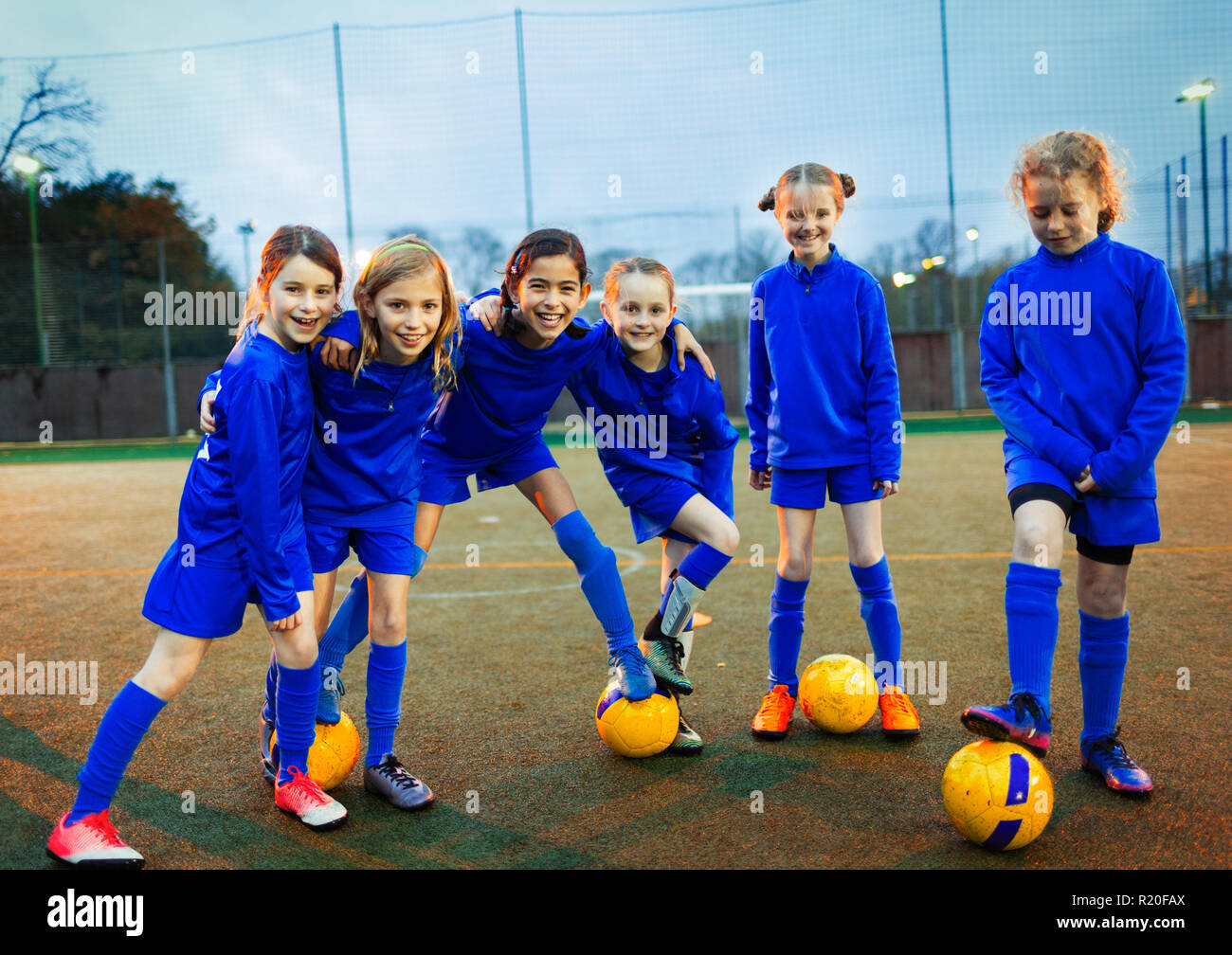 Équipe féminine de soccer Portrait confiant Banque D'Images
