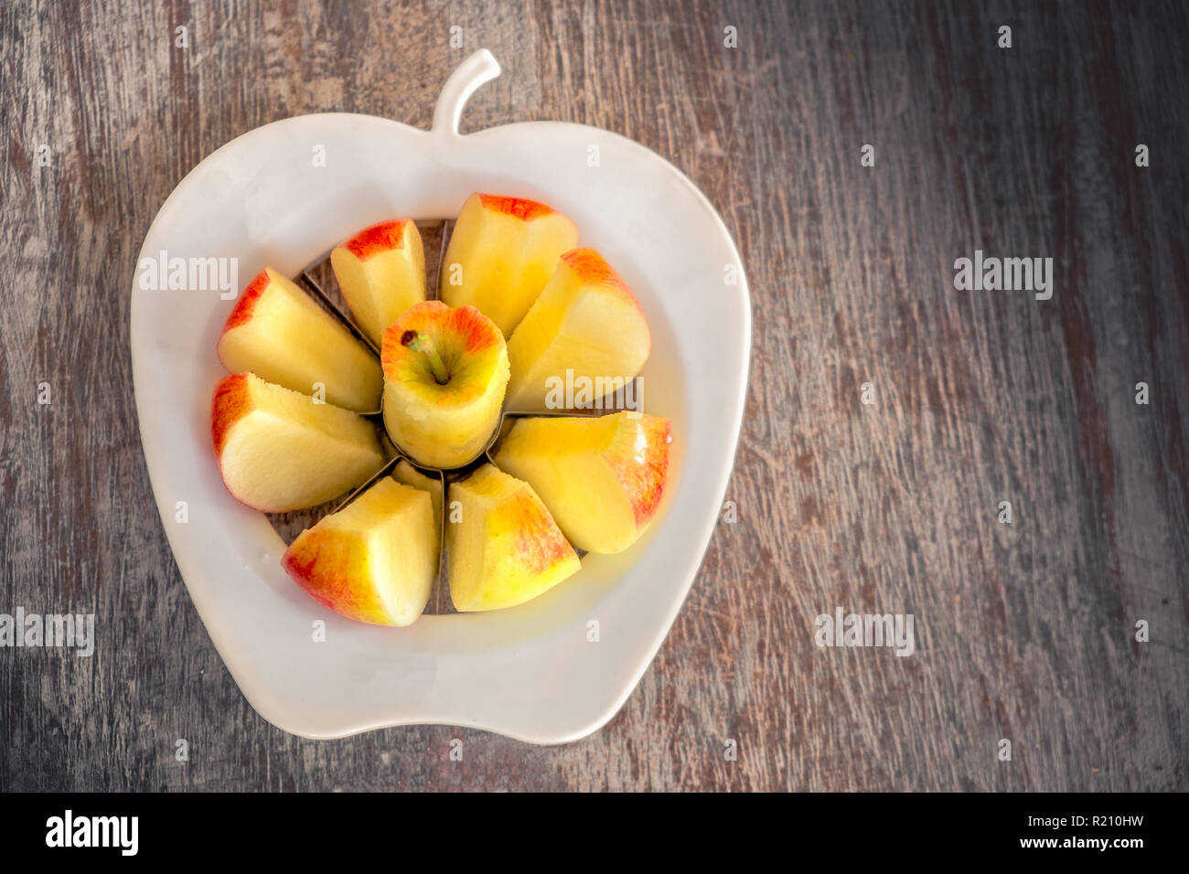 Arrière-plan de l'alimentation propre tranches de pomme vide-pomme slicer Banque D'Images