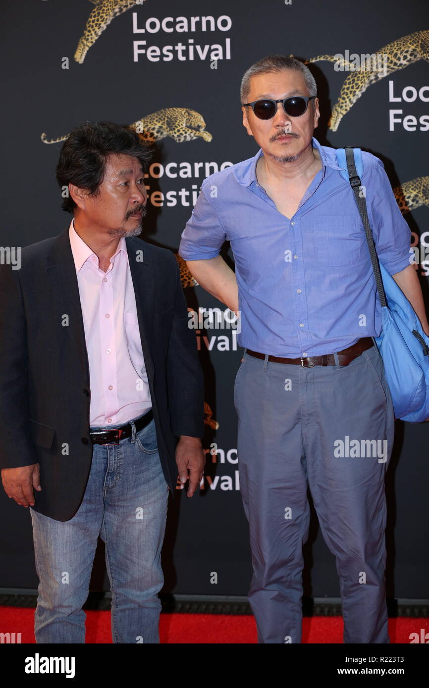 LOCARNO, SUISSE - Aug 11, 2018 : Hong Sang-soo (R) et Ju-Bong Gi (L) à la remise des Prix du 71ème Festival du Film de Locarno (ph : Mickael Chavet) Banque D'Images