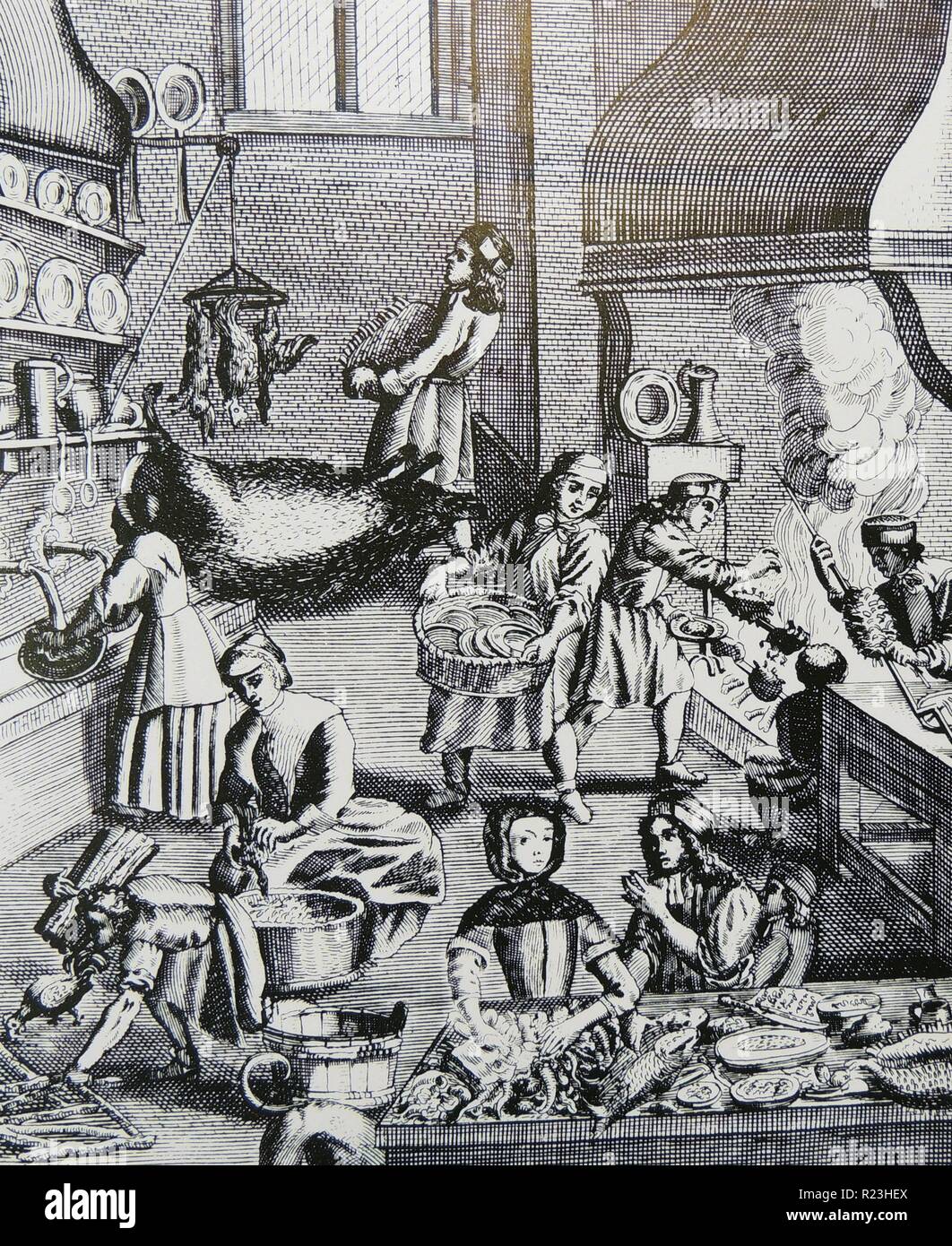 Vue générale de la cuisine d'une grande maison montrant la préparation et la cuisson des aliments. À partir de ''Magia naturalis'', Nuremberg, 1715, par Johannes Baptista della Porta. Première édition. Gravure Banque D'Images