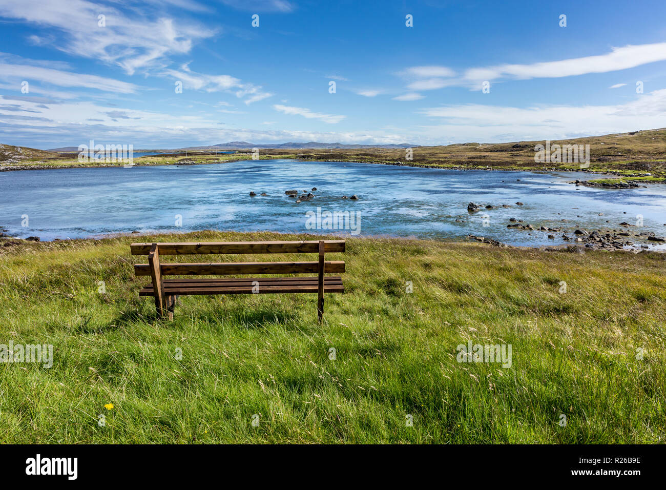 Banc d'une lagune, Conte de Knoll à pied et pique-nique, North Uist, îles Hébrides, Ecosse, Royaume-Uni, Europe Banque D'Images