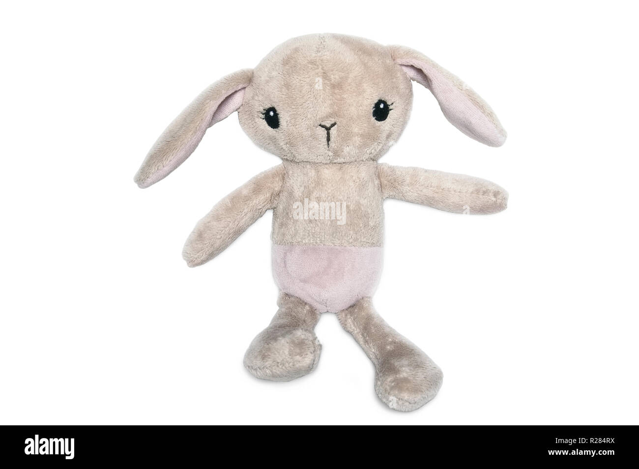 Le lapin en peluche beige est isolé sur fond blanc Banque D'Images