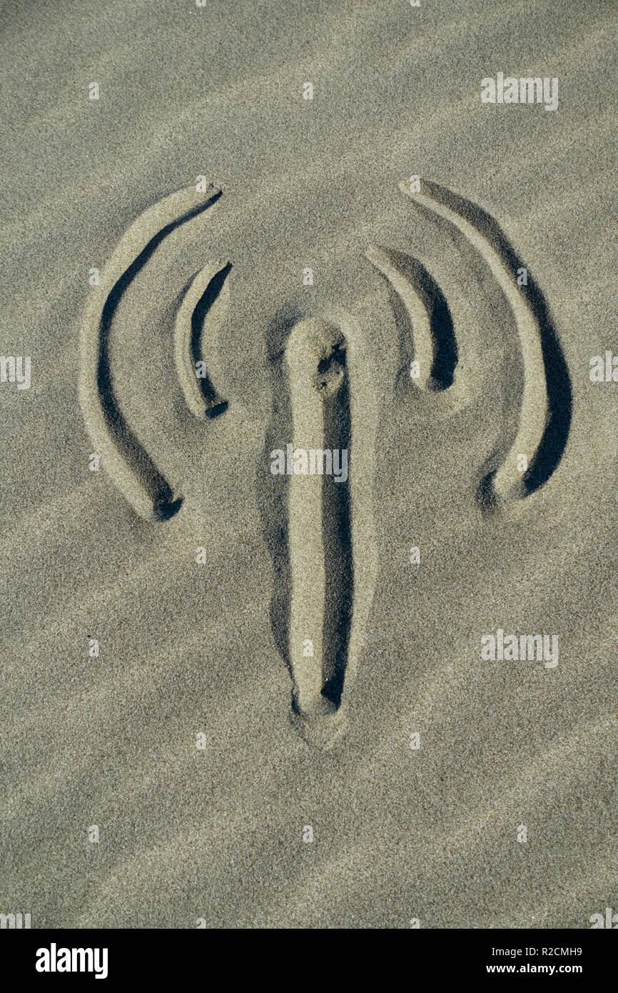 L'icône du signal dessiné sur le sable de la plage Banque D'Images