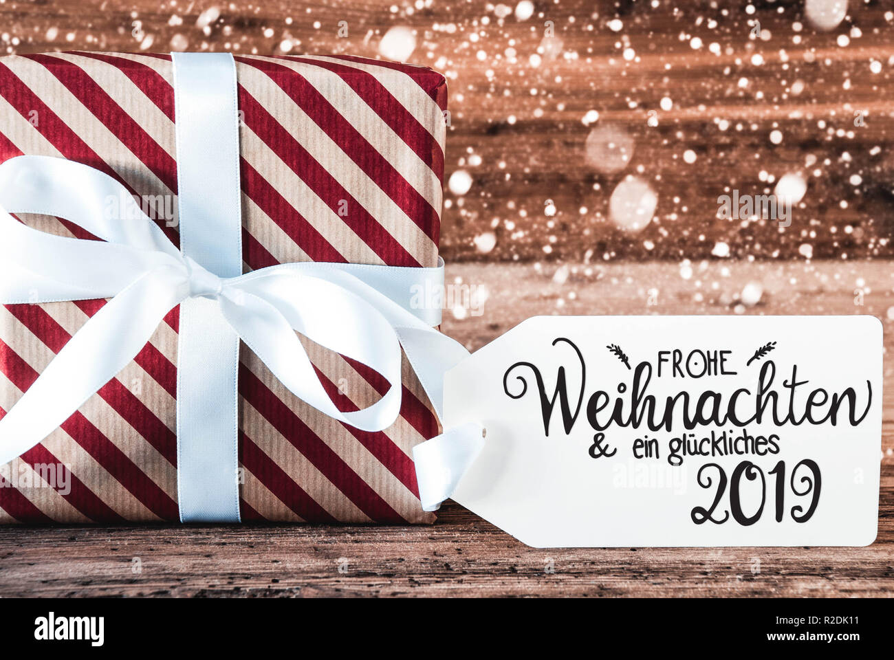 Cadeau, Glueckliches 2019 Calligraphie allemand signifie joyeux 2019, Snowflakes Banque D'Images