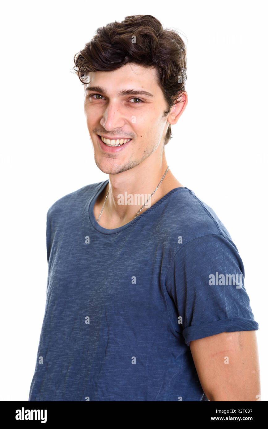 Studio shot of young happy handsome man smiling Banque D'Images