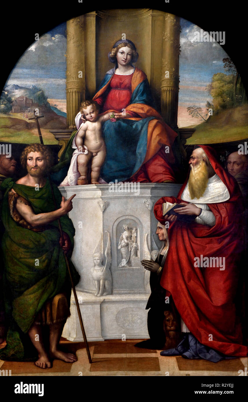 La Madonna col bambino dans trono - La Vierge et l'enfant ont intronisé 1517 Saints Jean-Baptiste, Gerolamo, François d'Assise, Saint Antoine de Padoue et le donateur Ludovica Trotti (connu sous le nom de ' Madonna del Pilastro Garofalo - Benvenuto Tisi (ou l'Il Garofalo) (1481 - 1559, l'Italie, l'italien. Banque D'Images