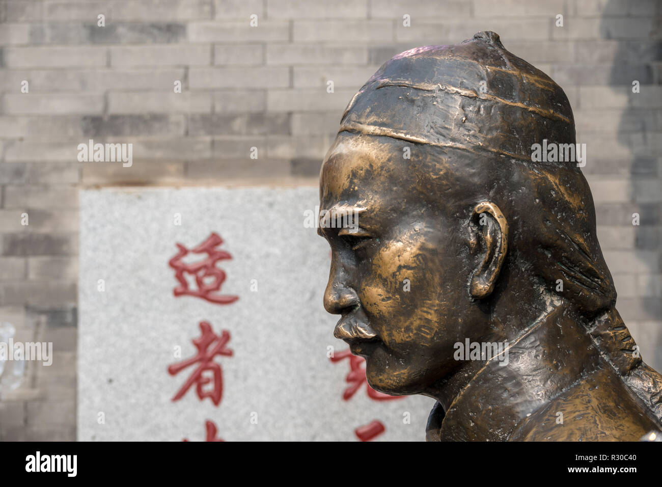 Rubbing statue good luck Banque de photographies et d’images à haute