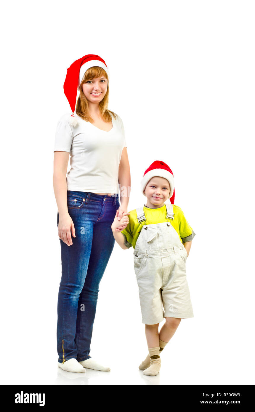 Mère et enfant dans des chapeaux de Noël Banque D'Images