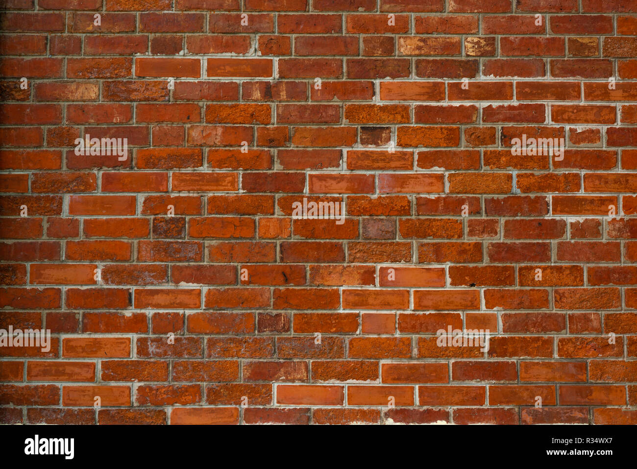 Mur de brique Orange texture background. Arrière-plan de texte. Architecture extérieure concept. Mur de brique orange sale abstract background. Pour l'arrière-plan Banque D'Images