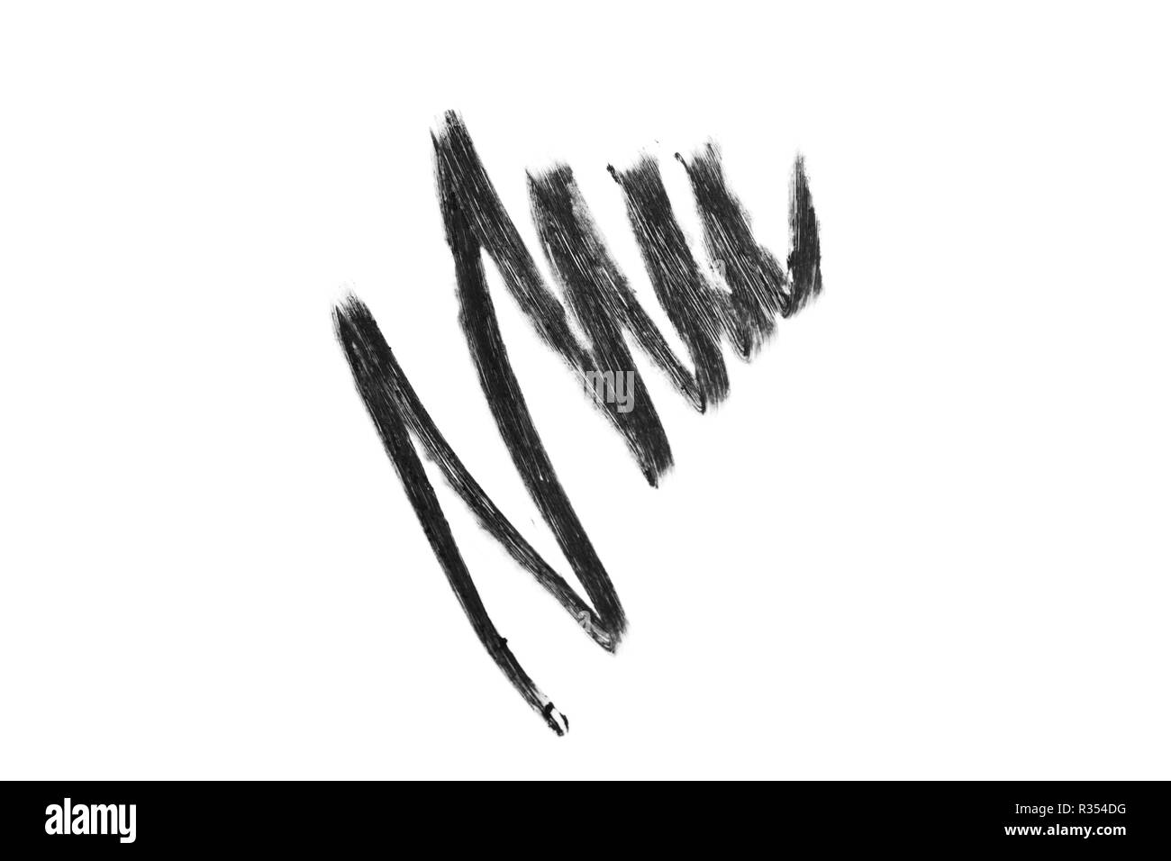 Un trait de crayon yeux noir isolé sur fond blanc. La bande de zigzag Banque D'Images