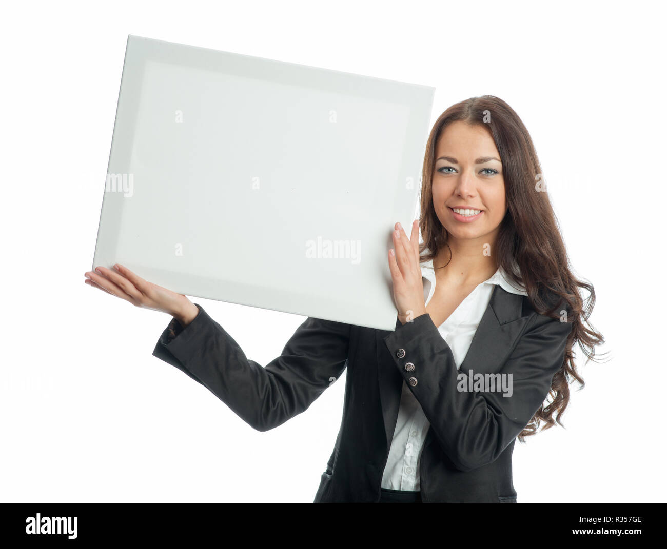 Businesswoman holding billboard Banque D'Images