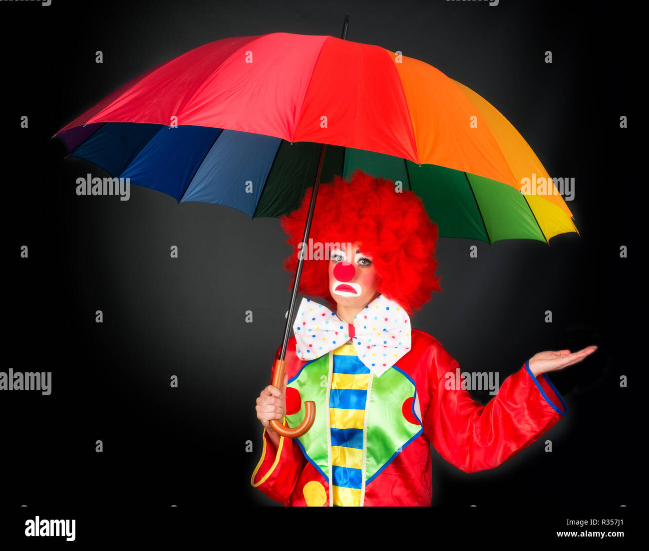 Clown avec parapluie Banque D'Images
