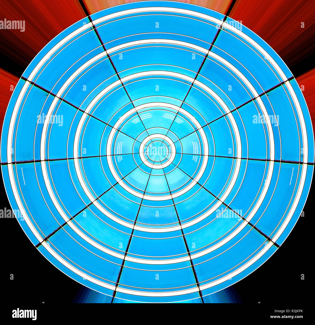 Le cercle bleu des fenêtres déformées en une image abstraite. Banque D'Images