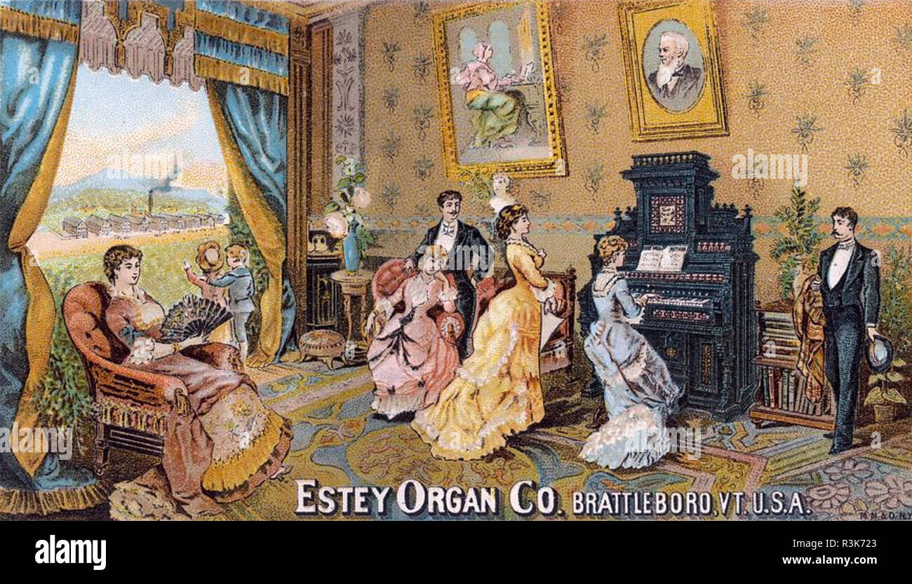 ESTEY Organ Company annonce à propos de 1870 montrant une famille américaine bénéficiant d'une soirée. Banque D'Images